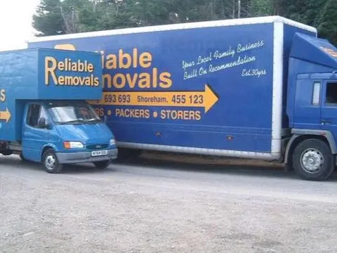 Reliable Removals van outside a property ready for a house move
