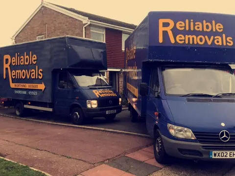 Reliable Removals van on the road near Worthing